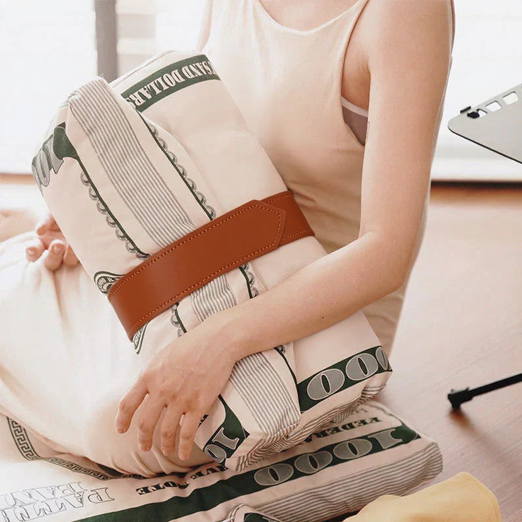 Catvera Catnip Chew Bite Pillow - Image 11|||PROMPT|||Cleaned image. Original analysis: Found multiple brand names and logos printed on the product packaging/wrapping including 'HONOR' text, currency/dollar bill designs with brand markings, and various text elements on the wrapped material