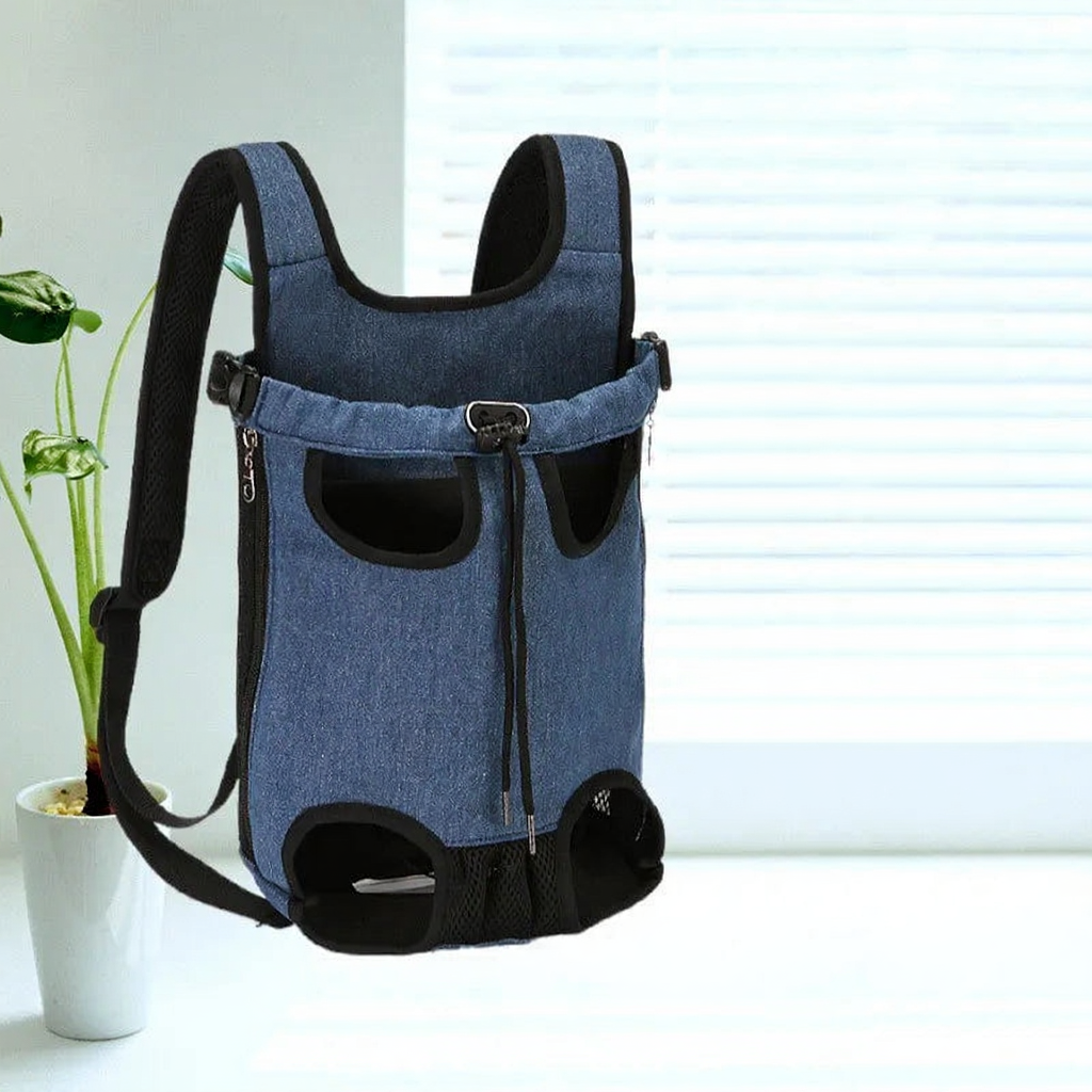 Breathable Pet Carrier Backpack with Mesh Windows - Image 3|||PROMPT|||Cleaned image. Original analysis: Found 1 brand logo/emblem on the main denim backpack carrier. The logo appears as a small circular or embossed mark on the front of the product.