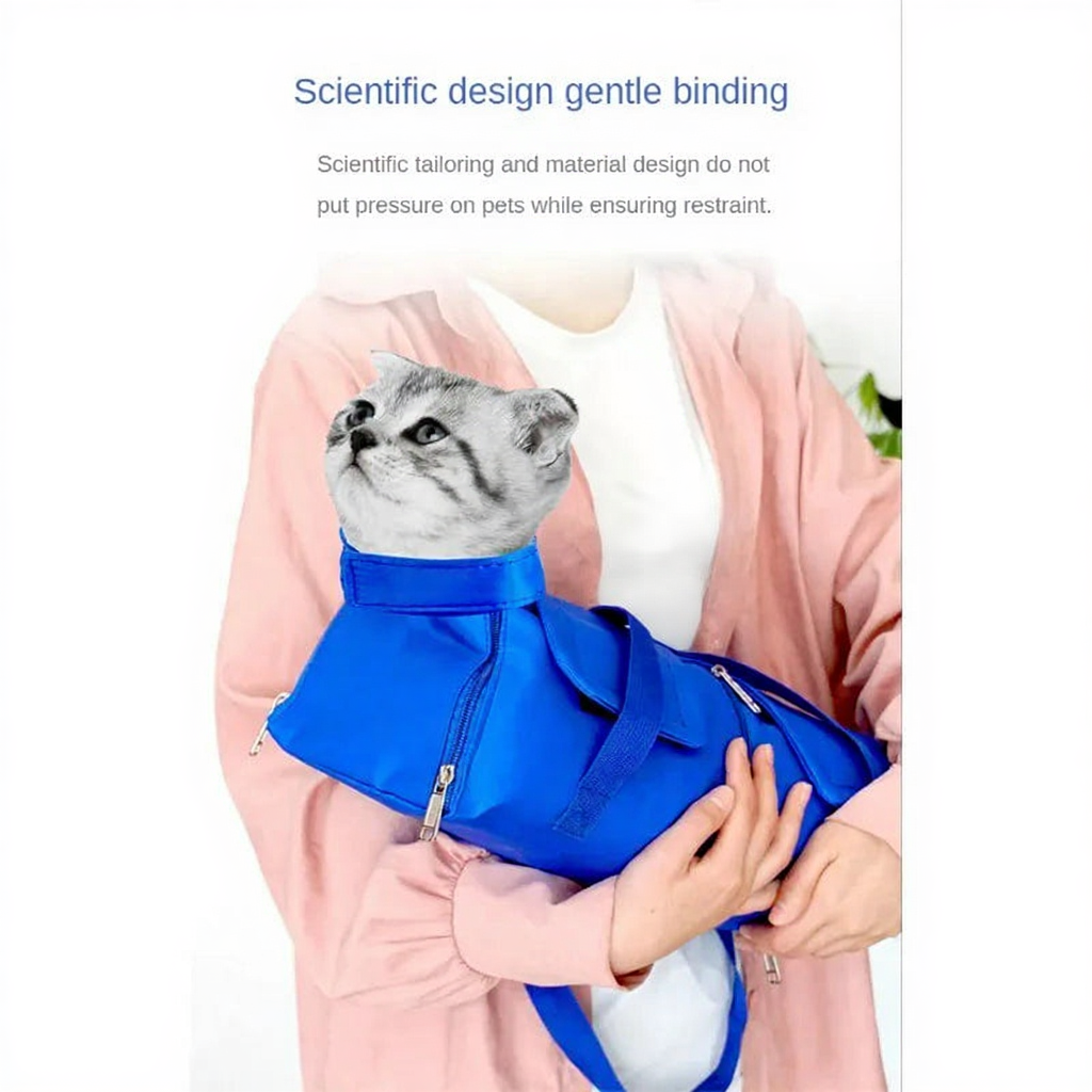 Cat Grooming Restraint Bag for Vet Visits - Image 3|||PROMPT|||Cleaned image. Original analysis: Found text overlay 'CAT' on the shirt worn by the person holding the product, which appears to be part of a branded graphic design on the clothing item.