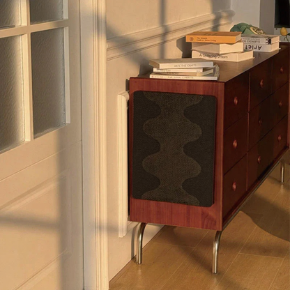 Catvera Adjustable Height Scratching Post - Image 18|||PROMPT|||Cleaned image. Original analysis: Found multiple brand names and text visible on book spines stacked on top of the furniture piece