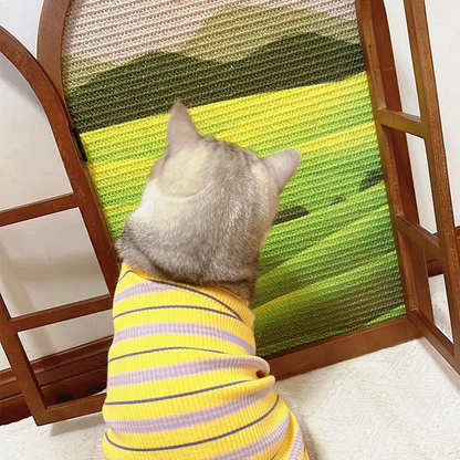 Catvera Artistic Window Cat Scratcher - Image 11|||PROMPT|||Cleaned image. Original analysis: found 1 brand logo on the cat's clothing