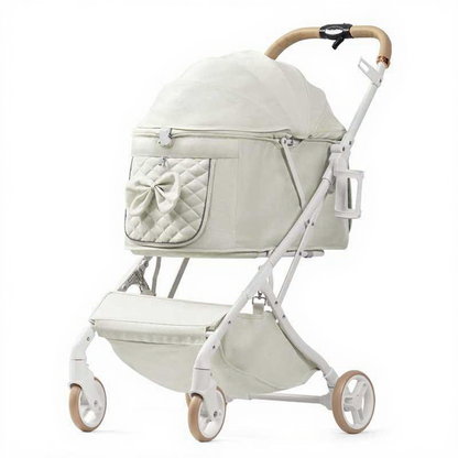 Catvera Bow Pet Stroller Carrier - Image 1|||PROMPT|||Cleaned image. Original analysis: found 1 brand name/logo on the product - 'Teknum' oval badge on the lower center of the stroller body