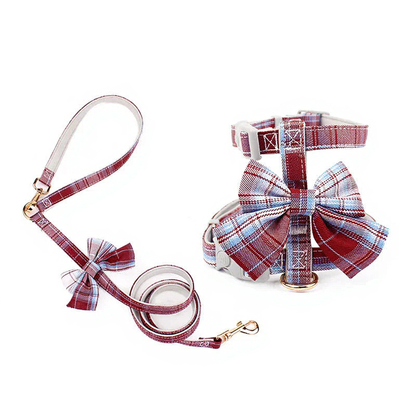 Catvera Bow Tie Cat Harness - Image 7|||PROMPT|||Cleaned image. Original analysis: Found brand name/logo stitched on the harness buckle area and visible on the collar tag of the harness piece on the right side of the image