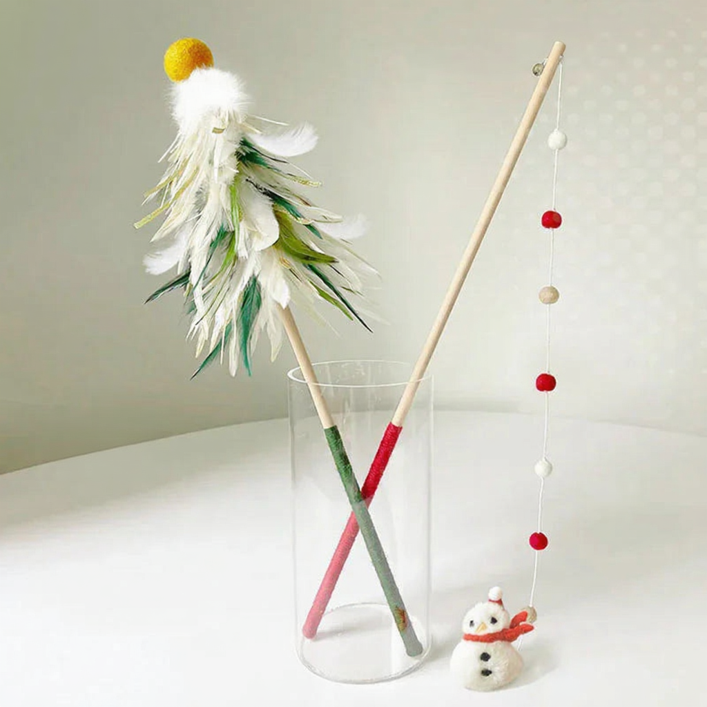Catvera Christmas Holiday Feather Teaser Wand - Image 5|||PROMPT|||Cleaned image. Original analysis: found 1 text watermark 'MERRY CHRISTMAS' in the top right corner of the image