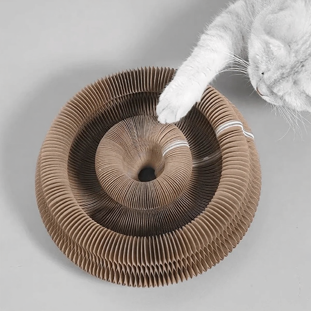 Catvera Corrugated Cardboard Cat Scratcher - Image 3|||PROMPT|||Cleaned image. Original analysis: found 1 red logo/branding element on the product itself at the bottom center of the circular corrugated structure