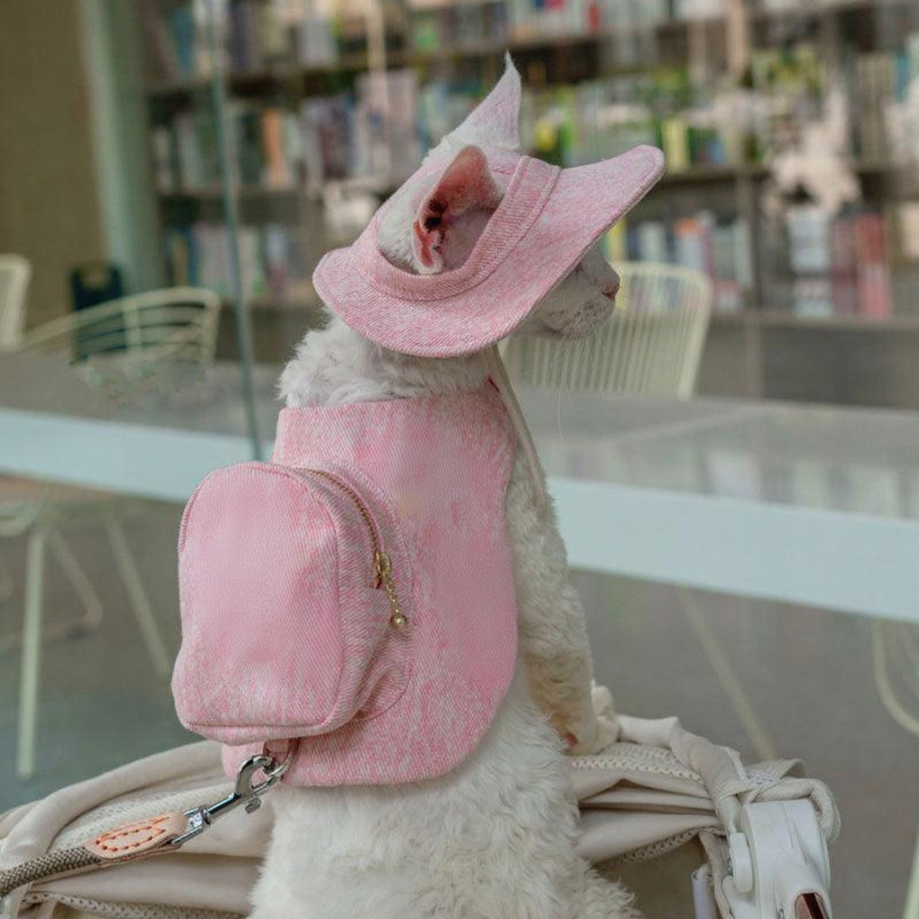 Catvera Cowboy Cat Harness Hat Set - Image 2|||PROMPT|||Cleaned image. Original analysis: Found brand name 'BELLO' stitched/printed on the pink harness/carrier fabric on the dog's back