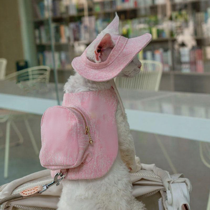 Catvera Cowboy Cat Harness Hat Set - Image 2|||PROMPT|||Cleaned image. Original analysis: Found brand name 'BELLO' stitched/printed on the pink harness/carrier fabric on the dog's back