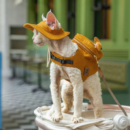 Catvera Cowboy Cat Harness Hat Set - Image 7|||PROMPT|||Cleaned image. Original analysis: Found multiple brand logos and text on the cat's outfit: a red circular logo on the harness/vest, green text on the vest, and what appears to be brand labeling on the saddle bag