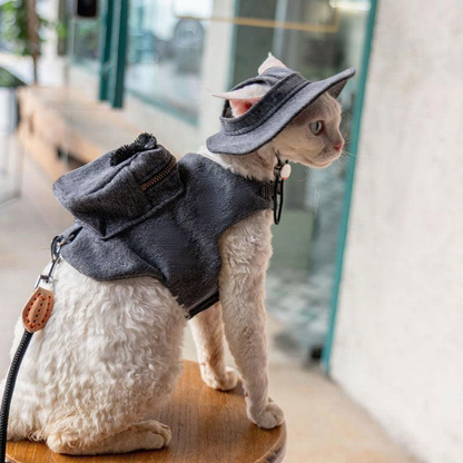 Catvera Cowboy Cat Harness Hat Set - Image 9|||PROMPT|||Cleaned image. Original analysis: Found brand name 'DUFELBAG' printed on the dark harness/backpack worn by the cat, and a cowboy hat with branding on the cat's head
