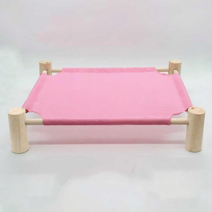 Catvera Elevated Summer Cat Hammock - Image 6|||PROMPT|||Cleaned image. Original analysis: Found Hello Kitty character branding and text scattered throughout the pink fabric surface of the pet bed