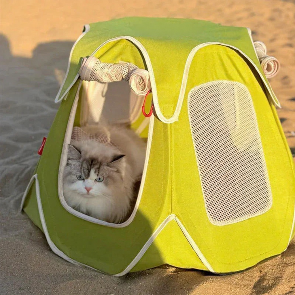 Catvera Foldable Outdoor Cat Tent - Image 9|||PROMPT|||Cleaned image. Original analysis: Found 1 brand logo/watermark on the product - a red circular logo visible on the top of the green and yellow tent/carrier