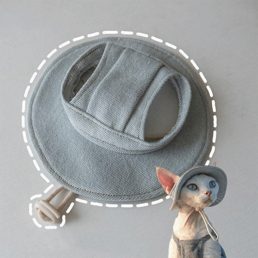 Catvera Hairless Cat Sun Hat - Image 10|||PROMPT|||Cleaned image. Original analysis: Found 1 brand name/logo stitched on the product - a small tag visible on the right side of the bib near the cat character