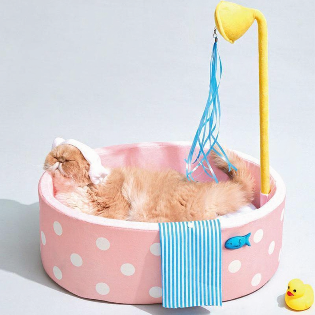 Catvera Japanese Hot Spring Cat Bed - Image 12|||PROMPT|||Cleaned image. Original analysis: Found 1 brand name/logo printed on the product - a black rectangular label/tag visible on the side of the pink pet bed