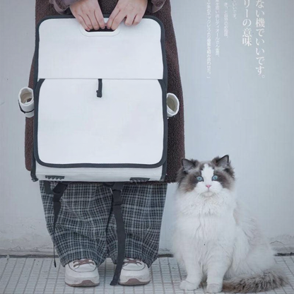 Catvera Milk Carton Cat Carrier - Image 10|||PROMPT|||Cleaned image. Original analysis: Found 1 brand name printed directly on the backpack and 1 designer credit on the product