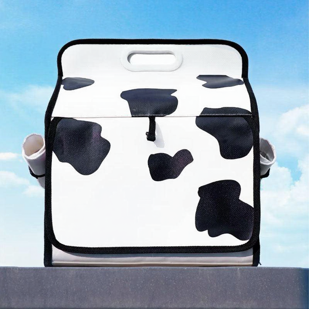 Catvera Milk Carton Cat Carrier - Image 13|||PROMPT|||Cleaned image. Original analysis: Found 2 brand names/text elements: 'milk' text and 'designed by purrpy' credit line printed on the milk carton design