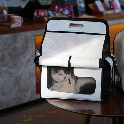 Catvera Milk Carton Cat Carrier - Image 2|||PROMPT|||Cleaned image. Original analysis: Found 1 brand name/logo on the product - visible branding on the black side panel/strap area of the pet carrier