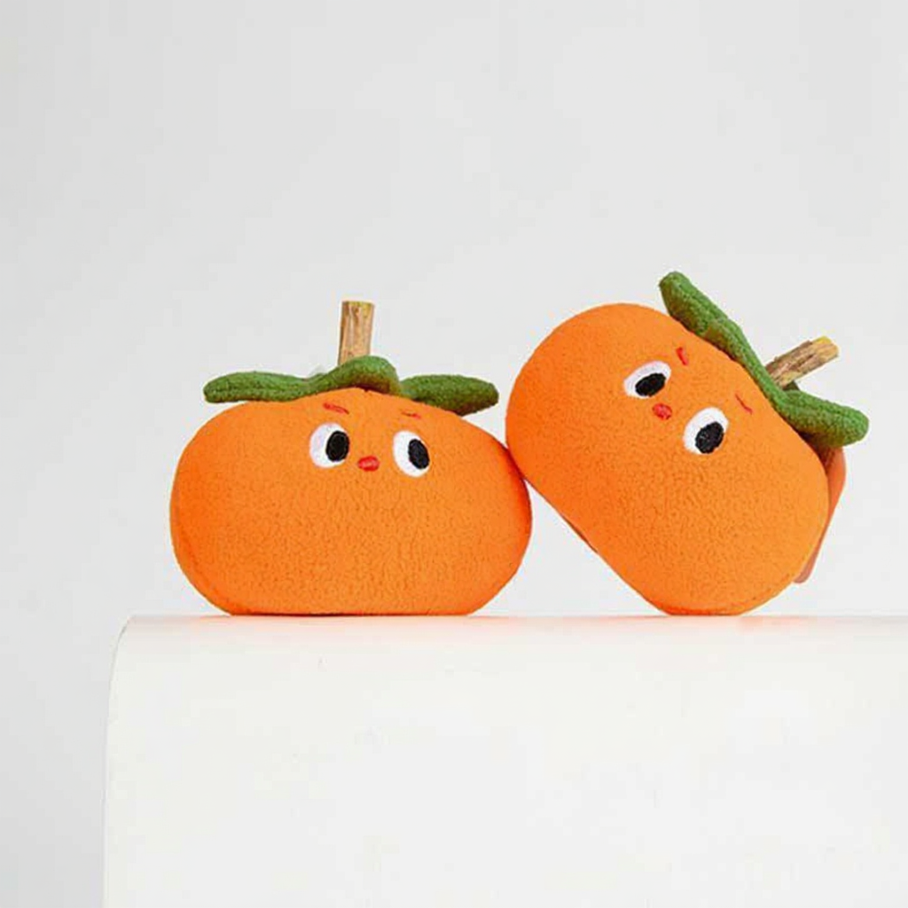 Catvera Orange Persimmon Dental Chew Toys - Image 5|||PROMPT|||Cleaned image. Original analysis: found 1 watermark text overlay at the top of the image