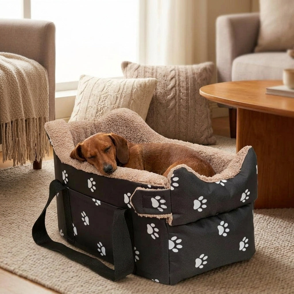 Catvera Oxford Travel Pet Bed - Comfort & Convenience|||PROMPT|||Cozy indoor scene with a small brown dog curled up peacefully in the plush-lined travel bed on a living room floor, soft natural lighting, comfortable home environment with throw pillows and warm textures surrounding the bed