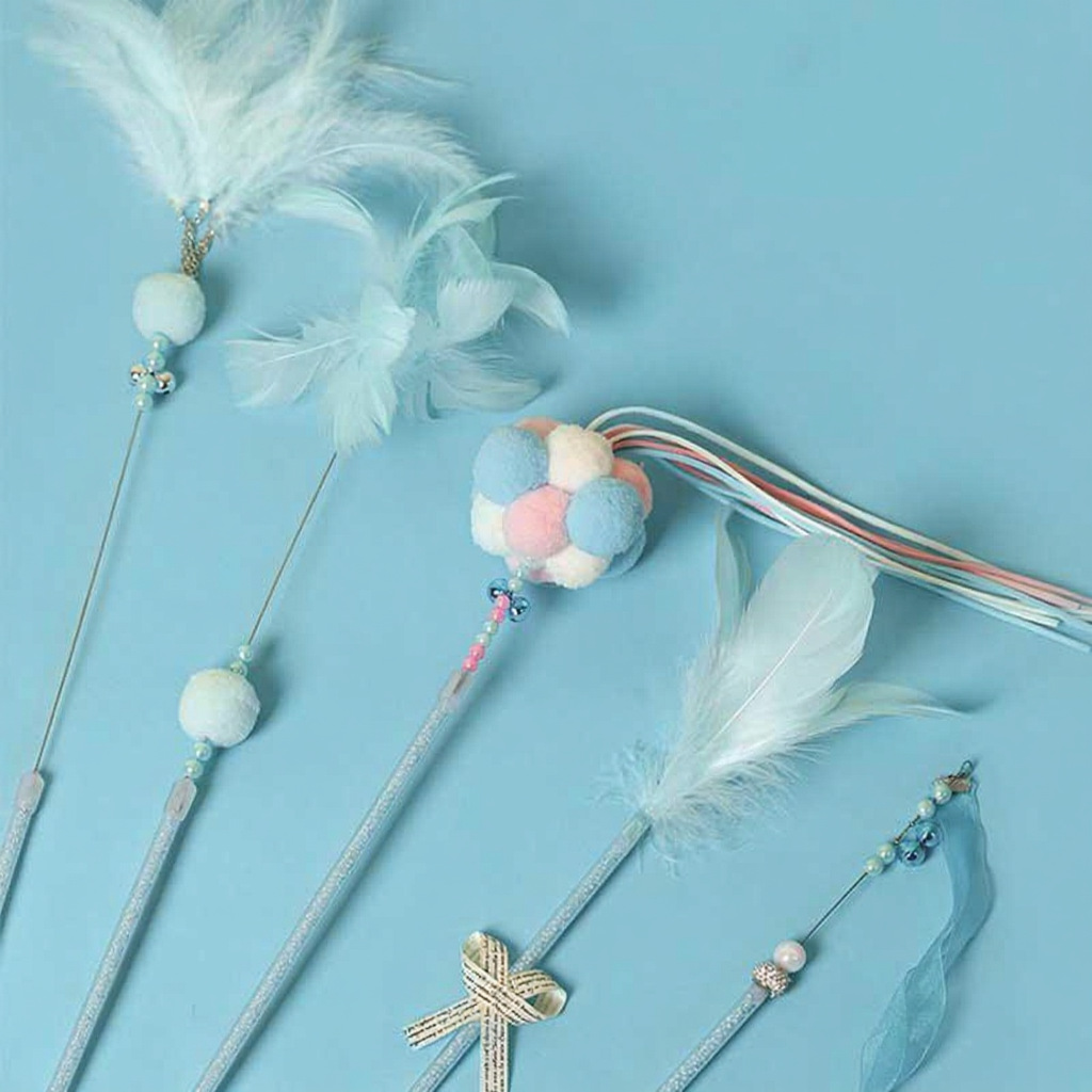 Catvera Plush Feather Teaser Wand Toy - Image 10|||PROMPT|||Cleaned image. Original analysis: found 1 text watermark 'MEWCATS' in white at the top left of the image