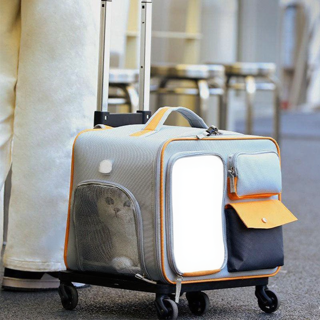 Catvera Rolling Wheeled Cat Carrier - Image 15|||PROMPT|||Cleaned image. Original analysis: Found 1 brand logo/emblem on the pet carrier - a circular metallic emblem/badge visible on the left side of the carrier front