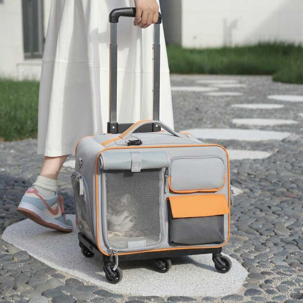Catvera Rolling Wheeled Cat Carrier - Image 6|||PROMPT|||Cleaned image. Original analysis: Found 1 brand logo on the pet carrier product - a circular brand emblem visible on the front pocket of the carrier
