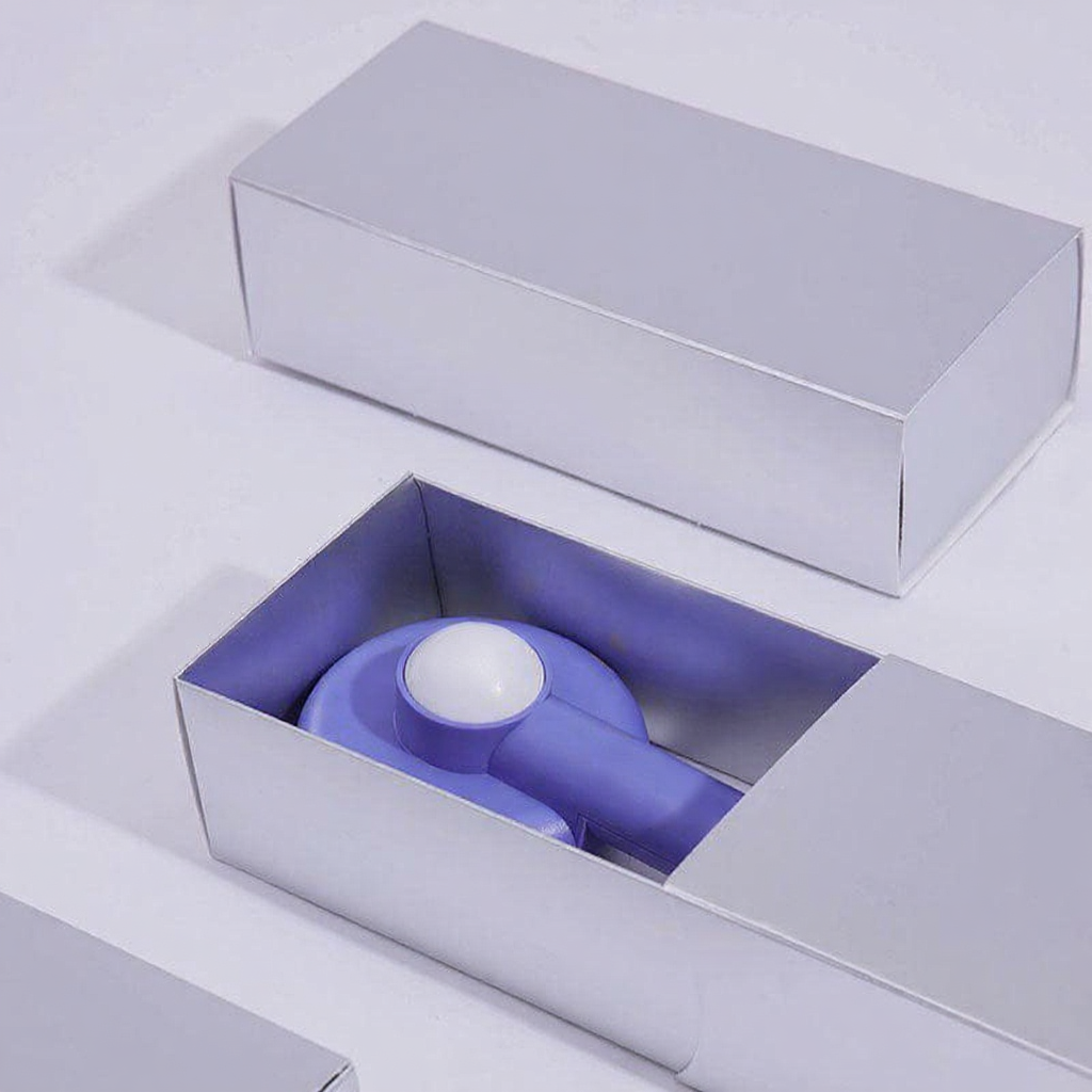 Catvera Self Cleaning Cat Hair Brush - Image 9|||PROMPT|||Cleaned image. Original analysis: Found 1 brand name printed on the product itself - text visible on the blue device/product