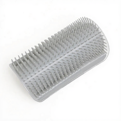 Catvera Self Grooming Corner Brush - Image 13|||PROMPT|||Cleaned image. Original analysis: found 1 brand name/logo embossed on the product surface on the right side of the brush