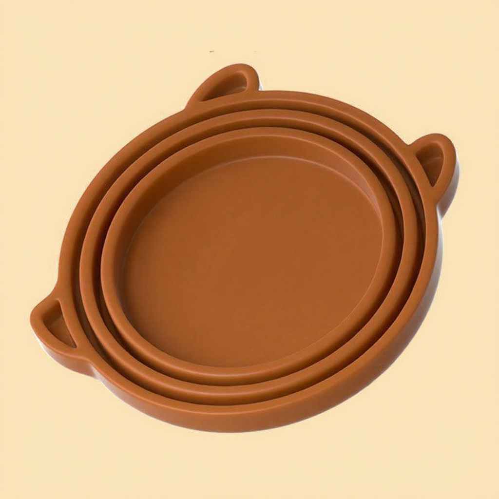 Catvera Silicone Pet Food Can Cover - Image 10|||PROMPT|||Cleaned image. Original analysis: found 1 brand name watermark on the product - partial text 'S' visible at bottom right corner of the image