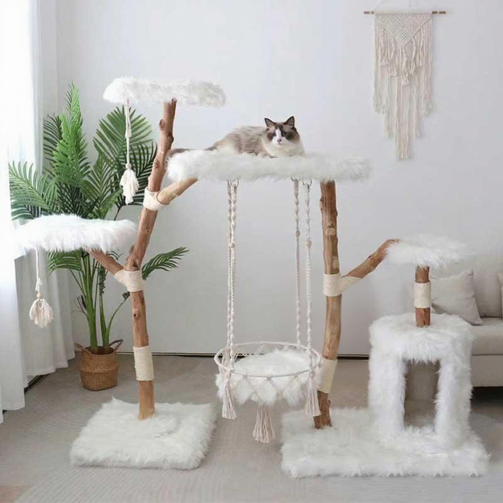 Catvera Solid Wood Cradle Cat Tree - Image 4|||PROMPT|||Cleaned image. Original analysis: Found 1 brand name/logo visible on the cat tree structure - appears to be a manufacturer tag or label on one of the middle platforms