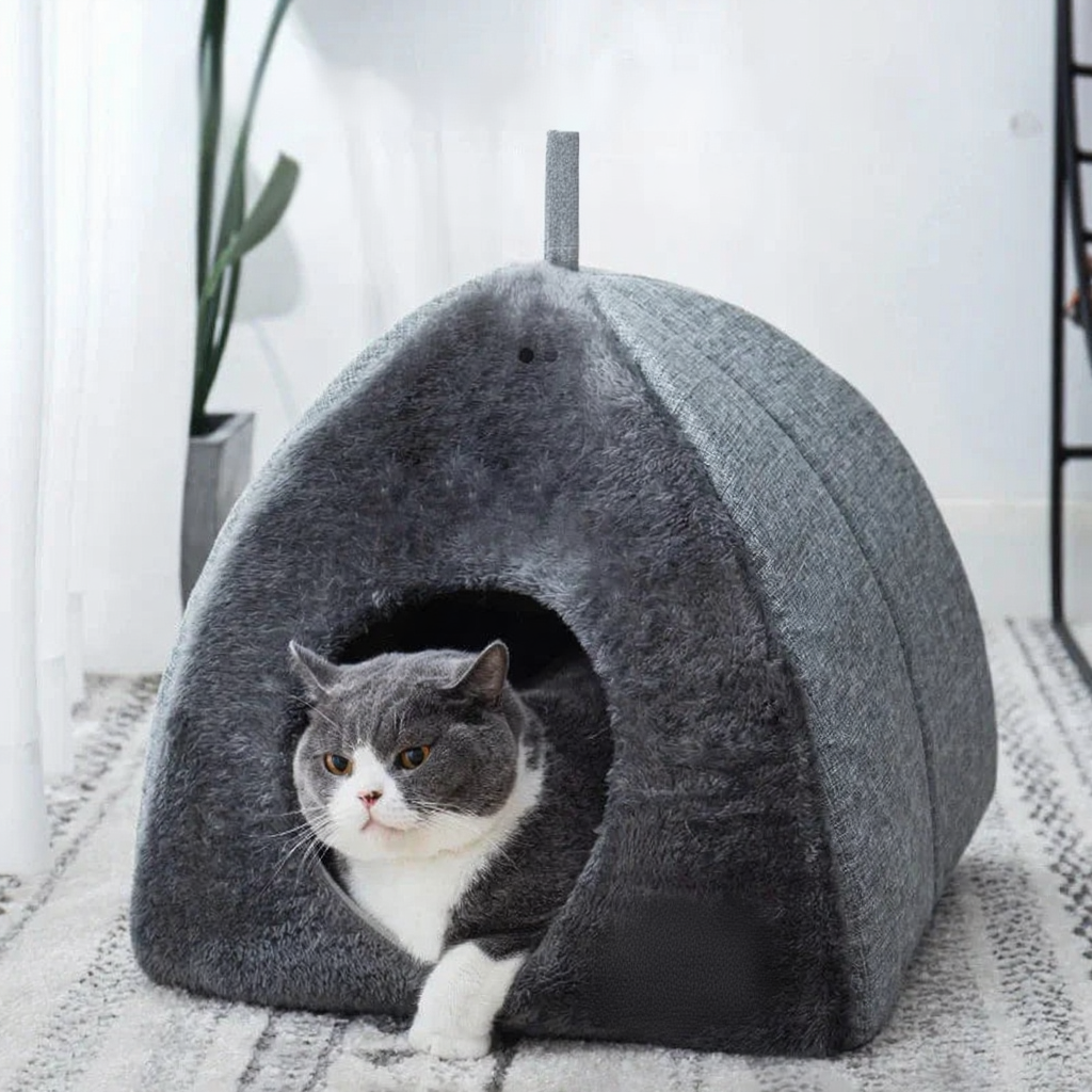 Catvera Triangle Enclosed Cat Nest - Image 1|||PROMPT|||Cleaned image. Original analysis: found 1 brand name stitched on the product and 1 watermark text overlay