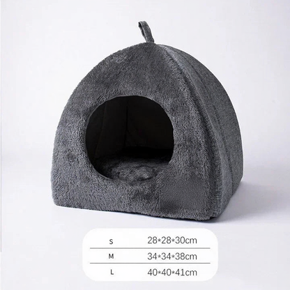 Catvera Triangle Enclosed Cat Nest - Image 7|||PROMPT|||Cleaned image. Original analysis: Found 1 brand logo patch on the product itself - a brown/tan rectangular 'Cat' brand label stitched onto the lower right side of the cat bed