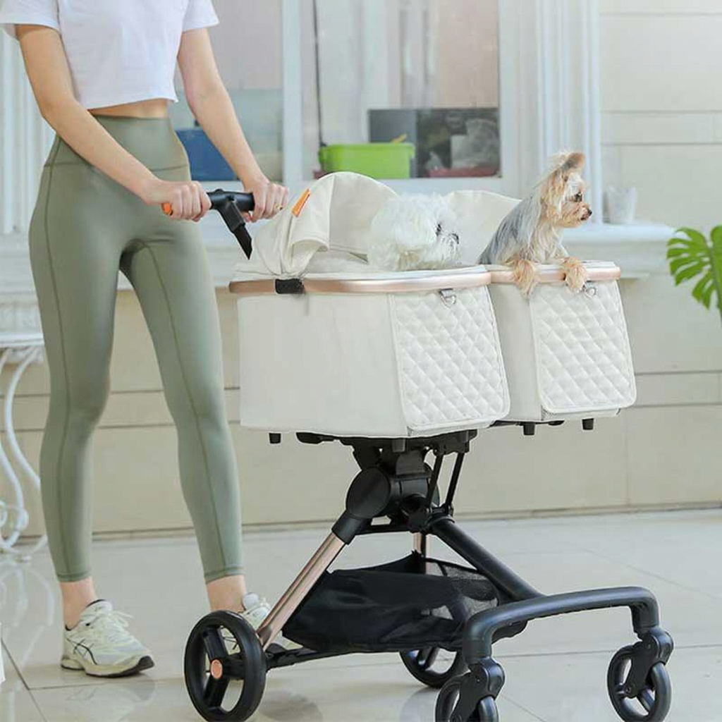 Catvera Twin Double Pet Stroller - Image 16|||PROMPT|||Cleaned image. Original analysis: Found 1 brand name printed on the stroller frame and 1 watermark on the image