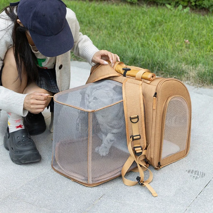 Expandable Cat Carrier Backpack with Privacy - Image 4|||PROMPT|||Cleaned image. Original analysis: Found 1 brand name/logo on the pet carrier backpack - the 'N' logo visible on the navy baseball cap worn by the person