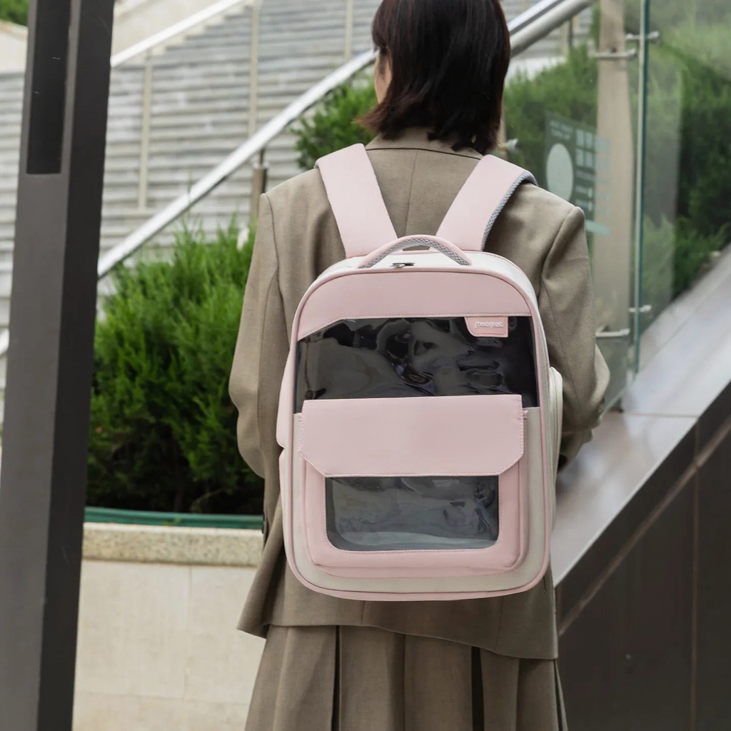 Hands-Free Adventure Pet Carrier Backpack - Image 5|||PROMPT|||Cleaned image. Original analysis: Found 2 brand names/logos: 'iPet' text label on the backpack front pocket and a decorative cat charm keychain with branding attached to the backpack